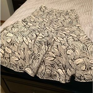 Beige/black skirt and beige top